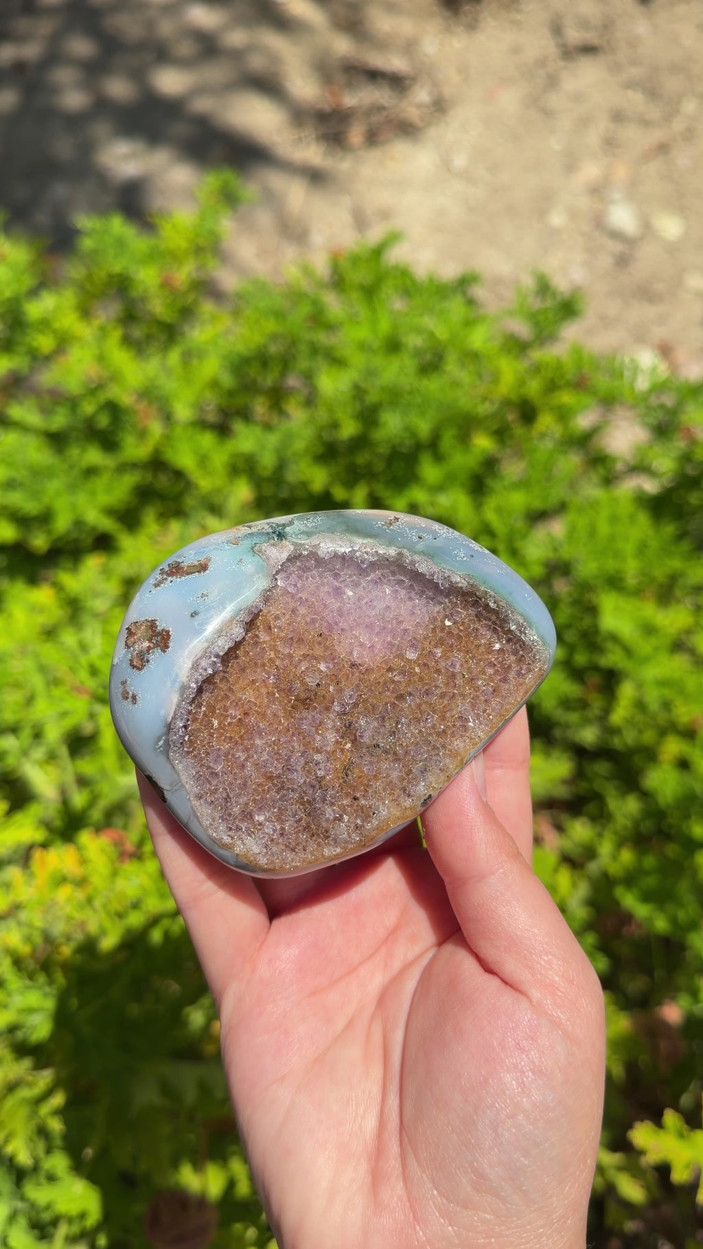 Uruguayan rainbow amethyst with blue/teal agate banding palm shaped Freeform. 
