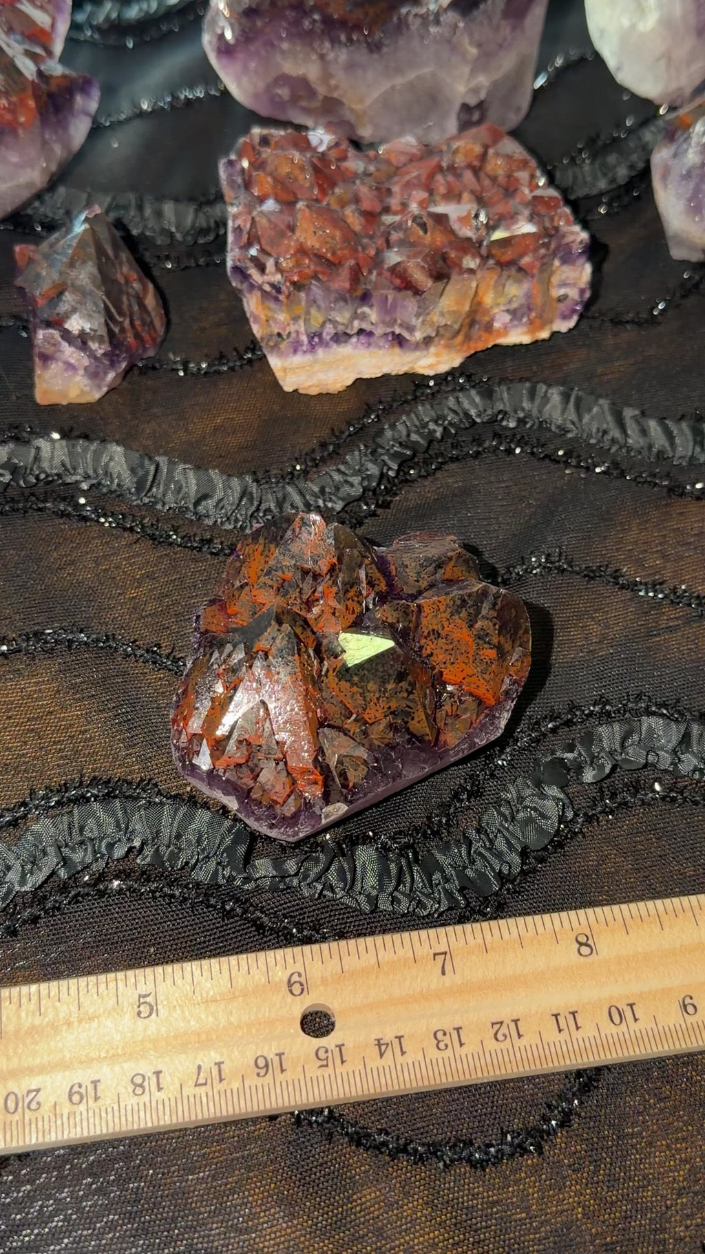 Dark red hematite included purple amethyst point cluster. Multi face terminations. 
