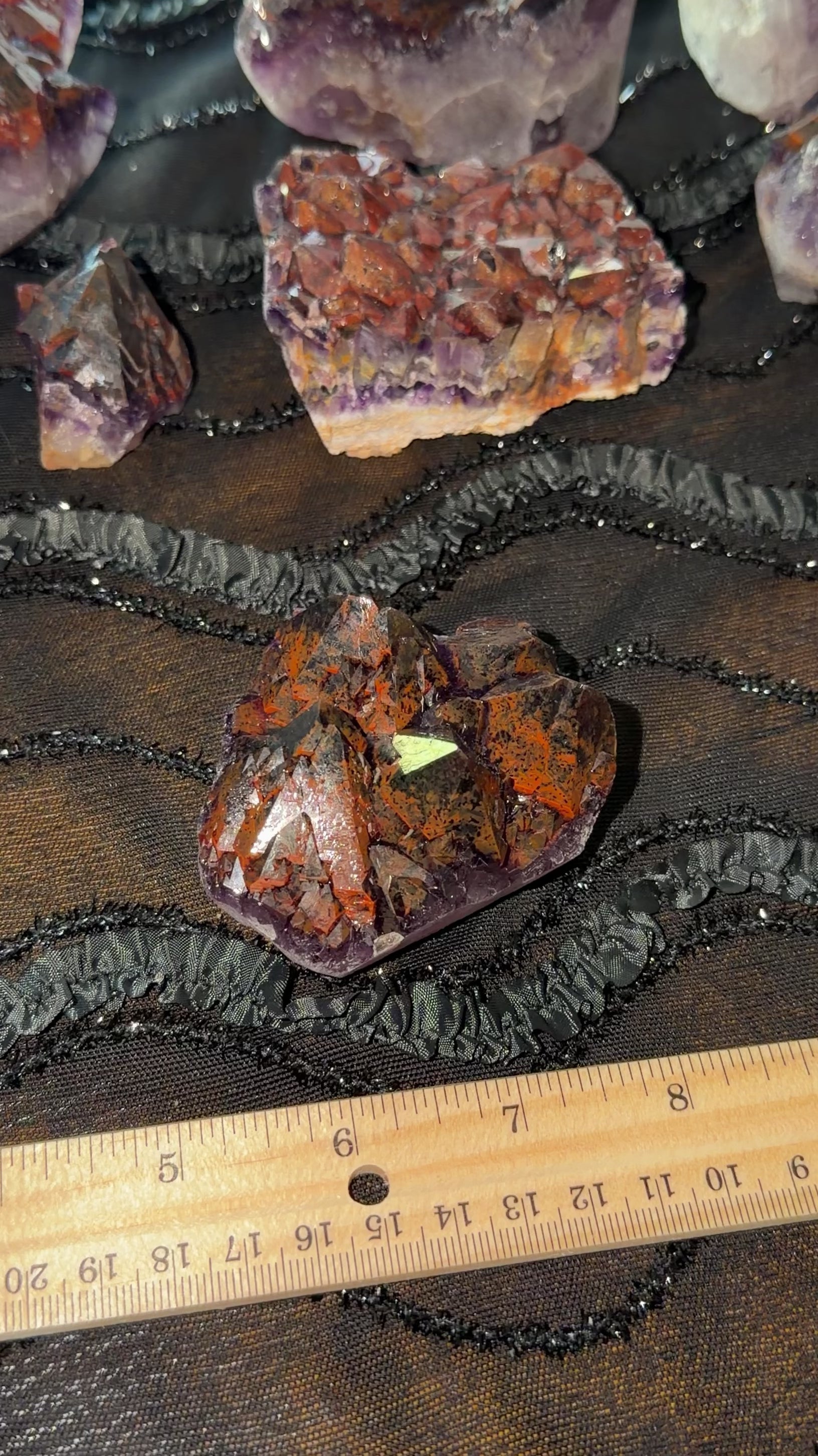 Dark red hematite included purple amethyst point cluster. Multi face terminations. 