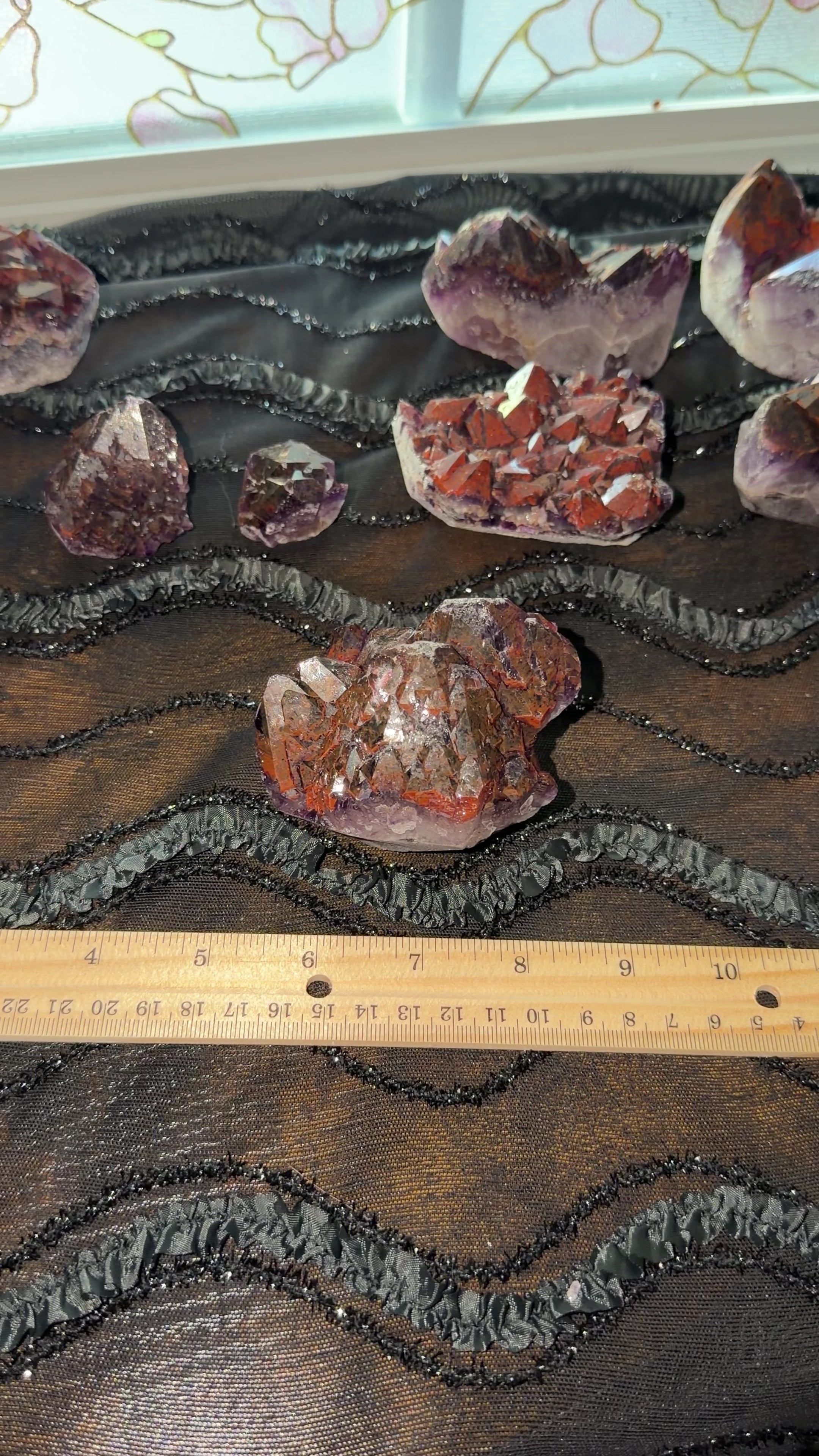 Red hematite included purple amethyst. 
Dimensions are
3.5 inch by 2.5 inch by 3 inch. 