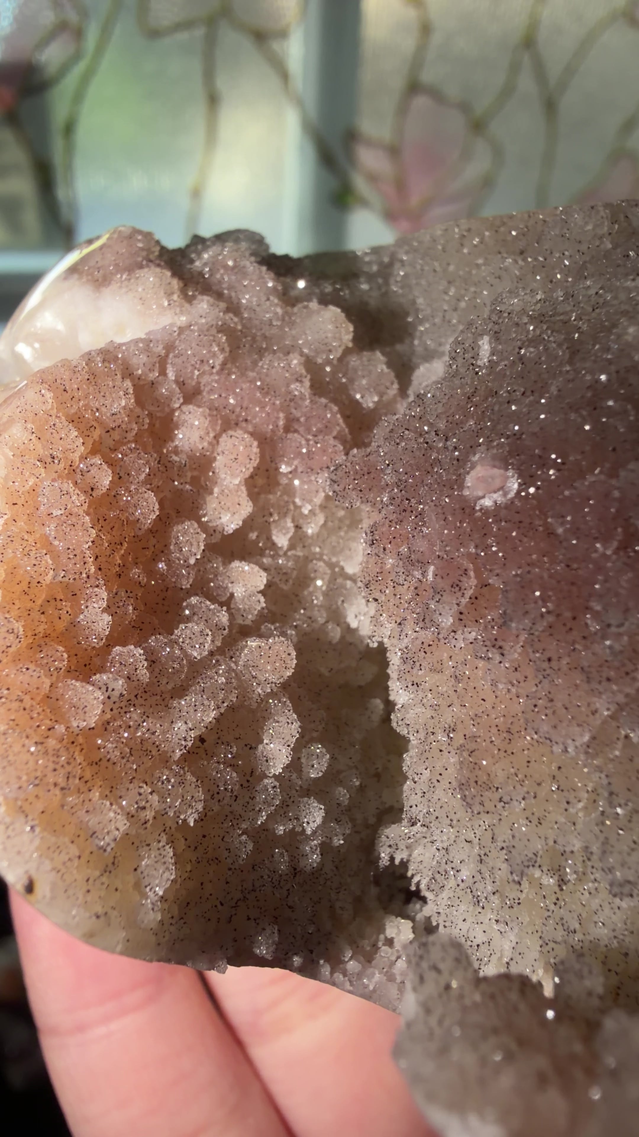 Close up highlighting the orange, red, and cream hues. Super druzy botryoidal formations. 